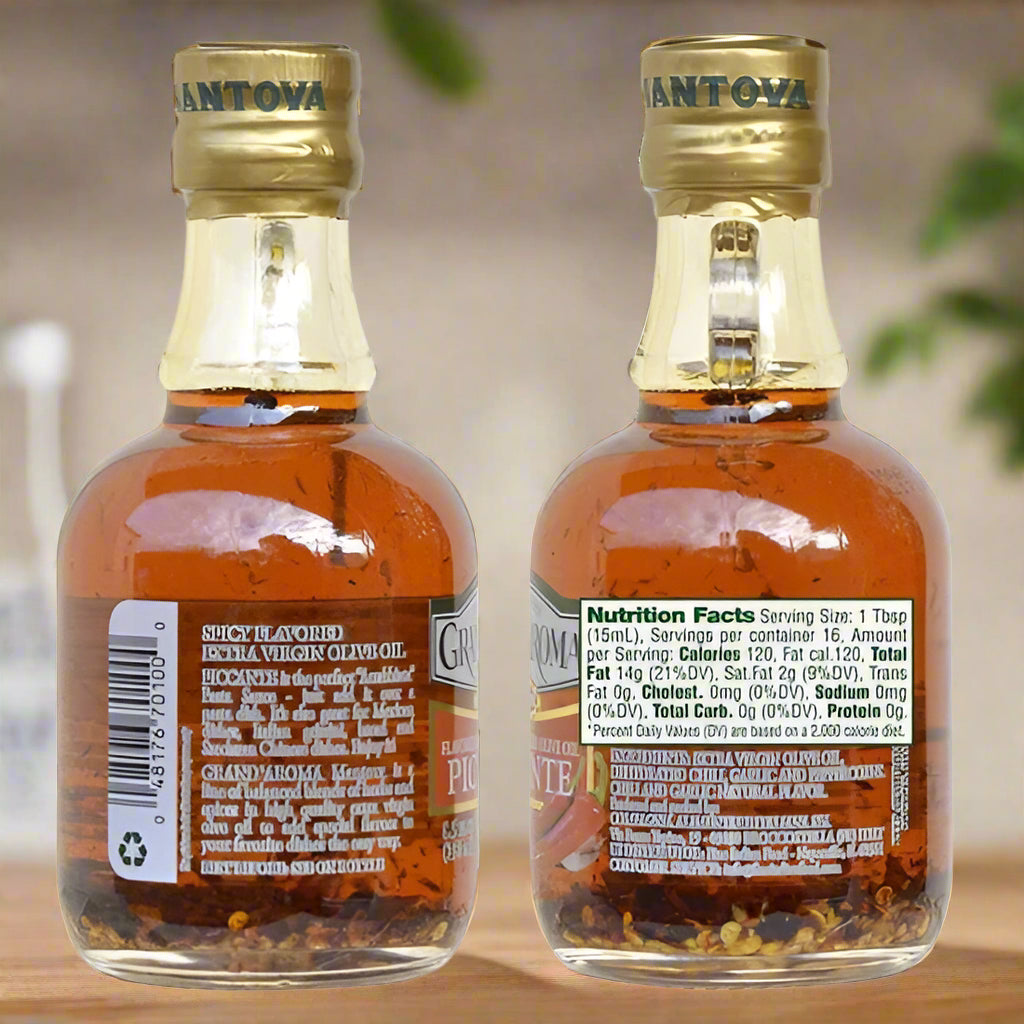 Two bottles of Antoiva spice and vinegar with labels on a white background