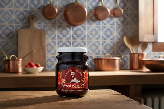 Jar of strawberry jam with a red label featuring a person and strawberries on a white background