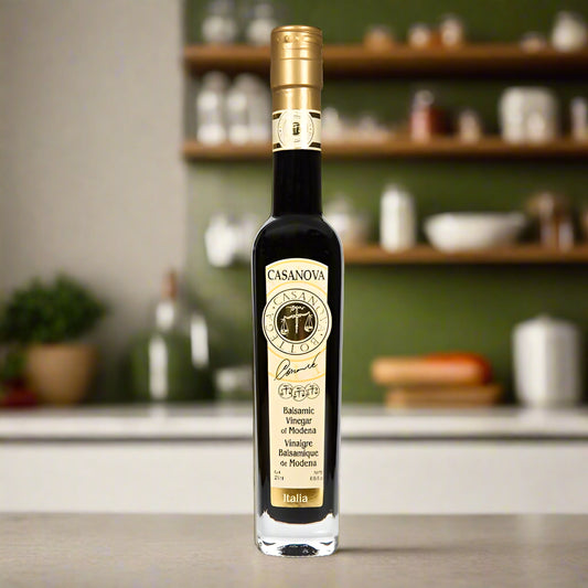 Bottle of Casanova balsamic vinegar on a white background